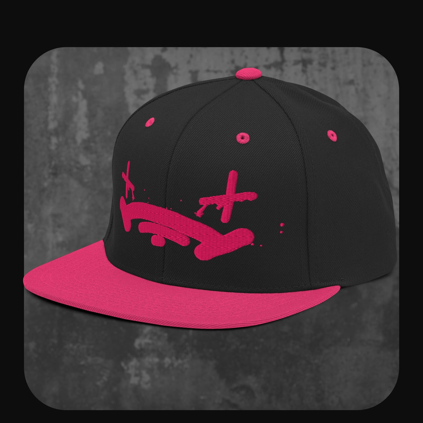 Rodney Logan Snapback Cap „Broken Heart“ mit pinkem Design auf schwarzer Front und farblich passendem Schirm.