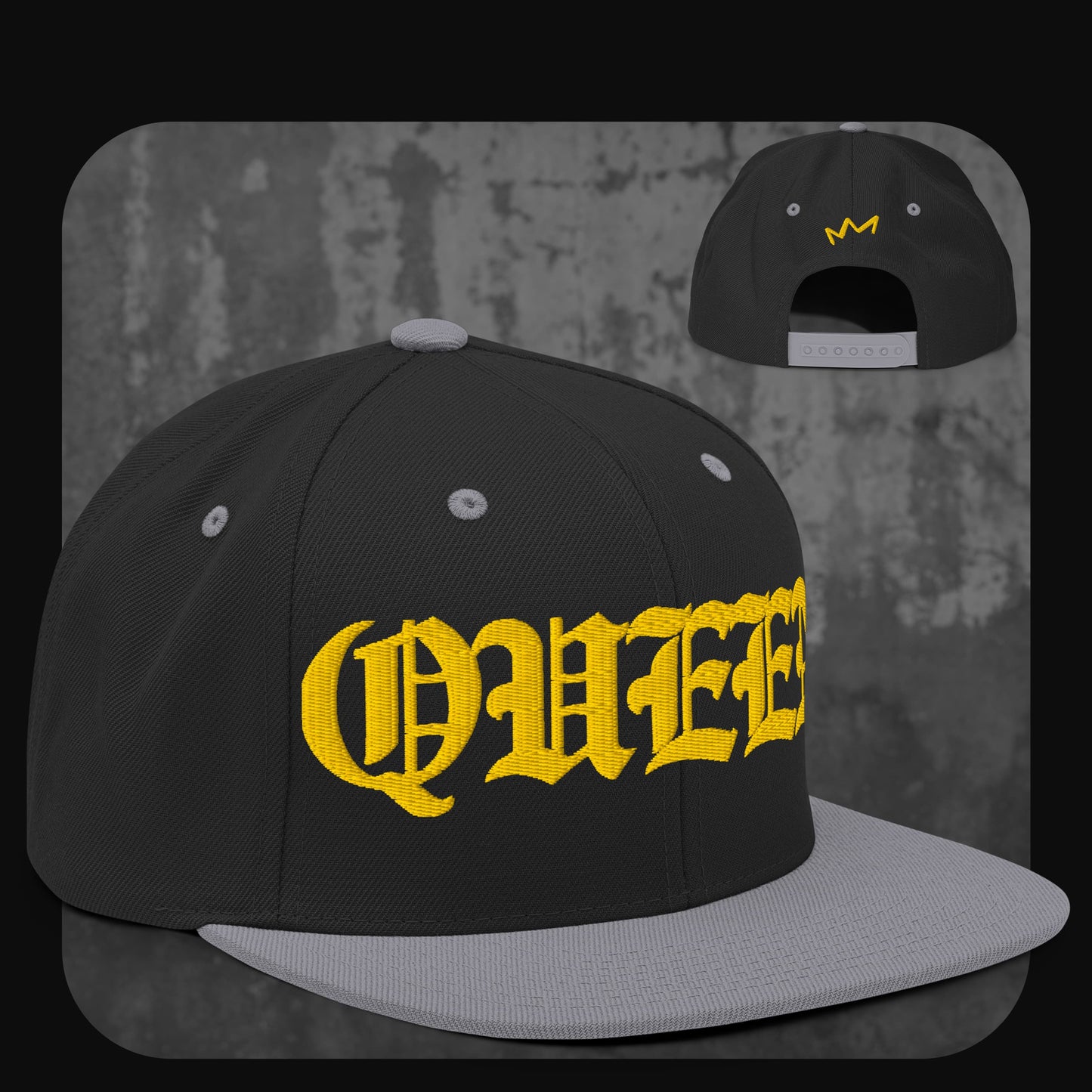 Schwarze Snapback-Cap mit grauer Krempe, grauen Ösen und Knopf. Vorne gelber „QUEEN“-Schriftzug, hinten kleine gelbe Krone.