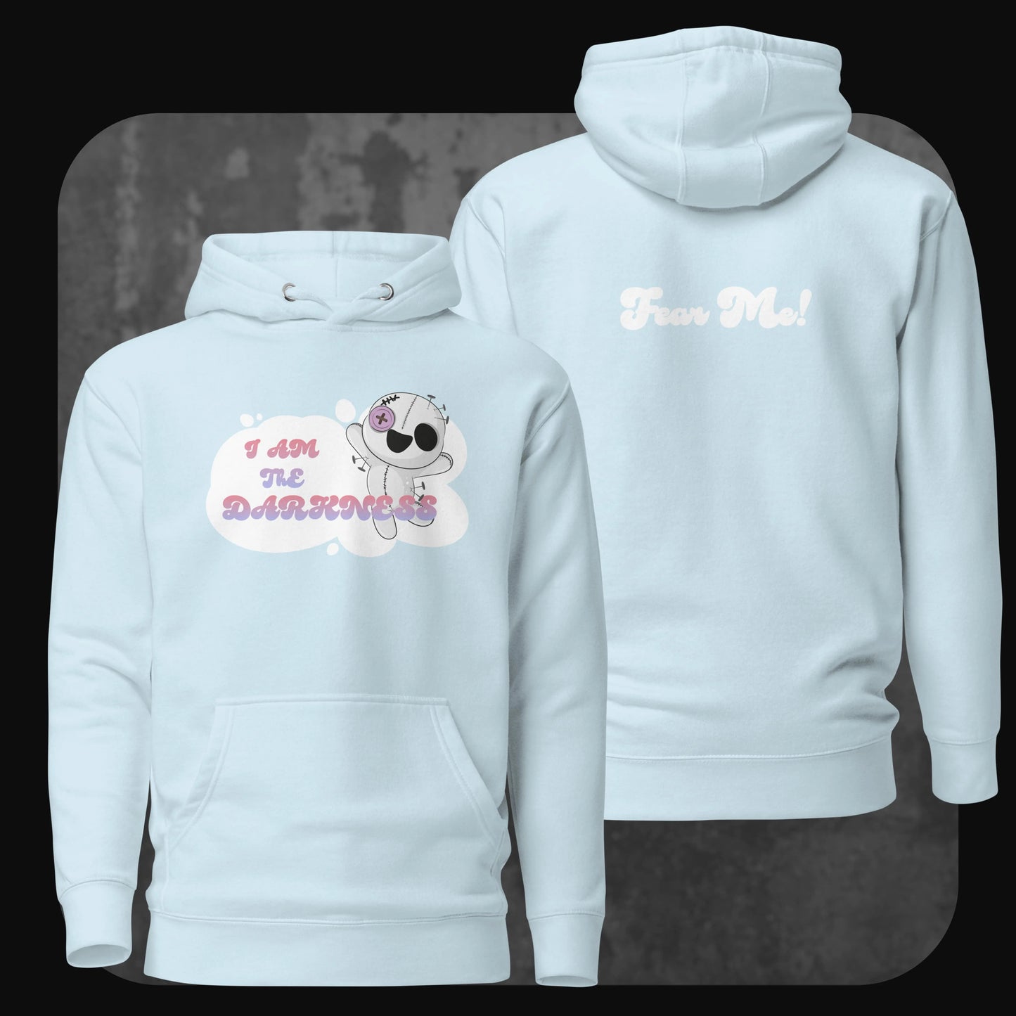 Front and back view of a light blue hoodie with the same playful goth plush design and pastel “Fear Me!” text on the back.