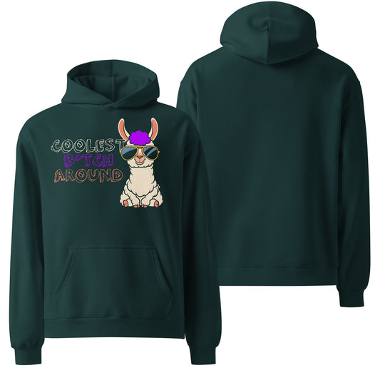 An oversized pine green hoodie with "Coolest Bitch Around" written in bold, white, retro-style lettering across the chest. A confident and playful statement piece.