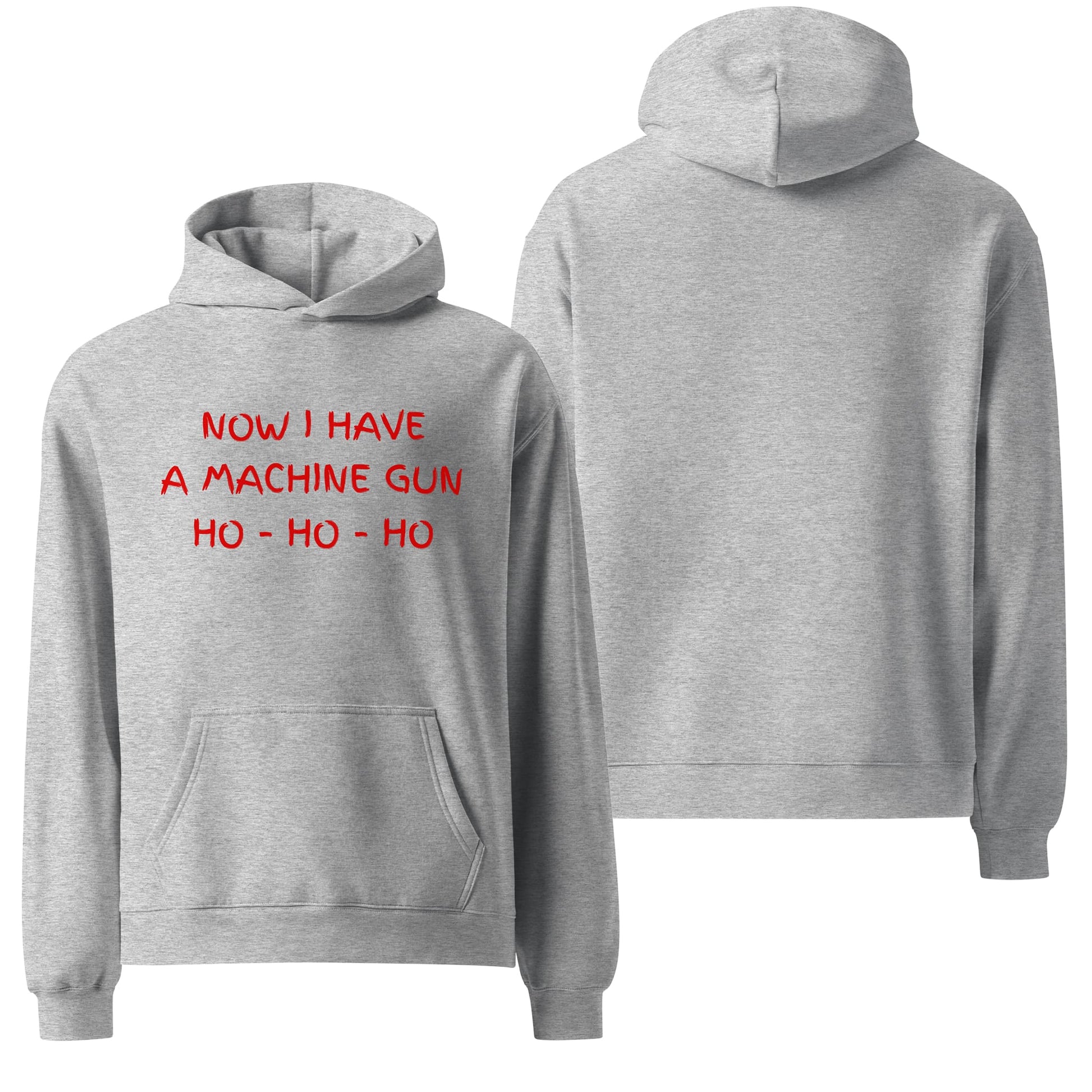 An oversized hoodie in athletic heather gray featuring the text "Now I have a machine gun, ho ho ho" in bold, red letters. The design references the iconic line from the movie Die Hard, blending holiday humor with a cult-classic vibe.