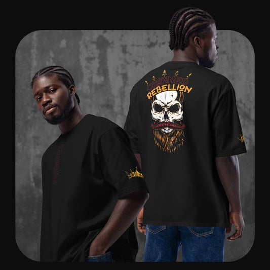 Two models wearing the black ‘Crowned Rebellion’ oversized t-shirt by RodneyLogan. The front displays a subtle vertical ‘REBEL’ text, while the back features a bold graphic of a skull with a crown and fiery beard, with ‘CROWNED REBELLION’ text above.