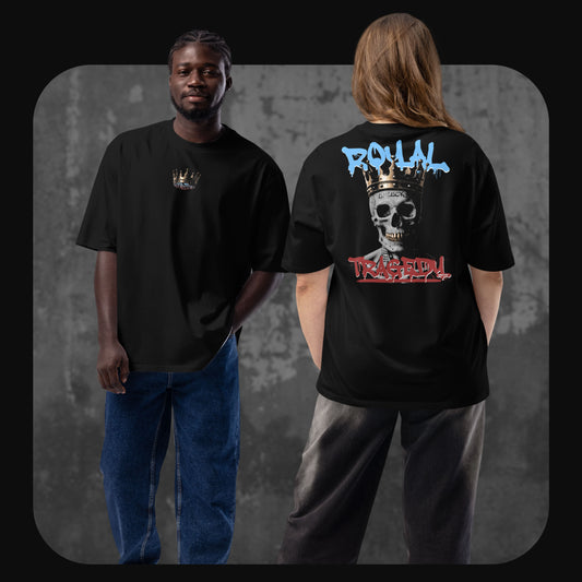 Two models wearing black oversized “Royal Tragedy” t-shirts. One model is facing forward, showing the small crown logo on the front, while the other model is turned to show the large skull and crown graphic with blue and red graffiti-style text on the back.