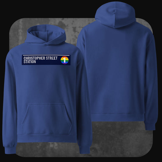 Front and back view of a blue hoodie featuring a “Christopher Street Station” patch with a rainbow subway logo on the front.