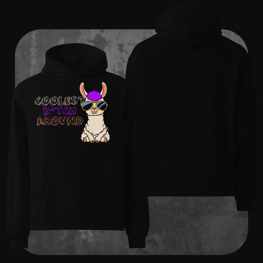 A black hoodie with a playful graphic of a llama wearing sunglasses and a purple afro wig on the front. The text “Coolest B*tch Around” is styled in colorful, handwritten fonts. The back is plain black